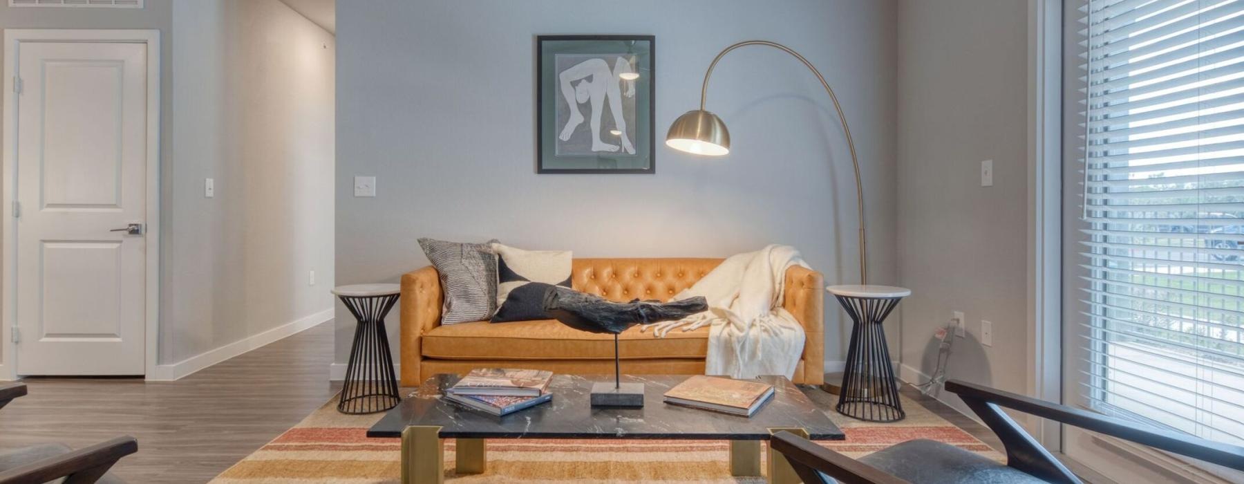 a living room with a couch and a coffee table